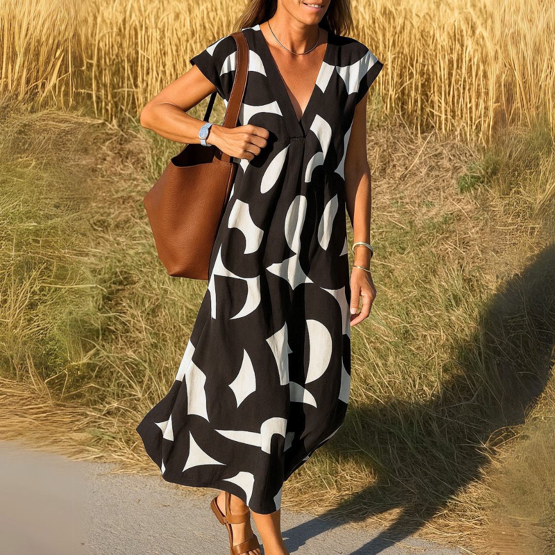 Marleen | Luchtige Zomerjurk met V-Hals en Grafische Print